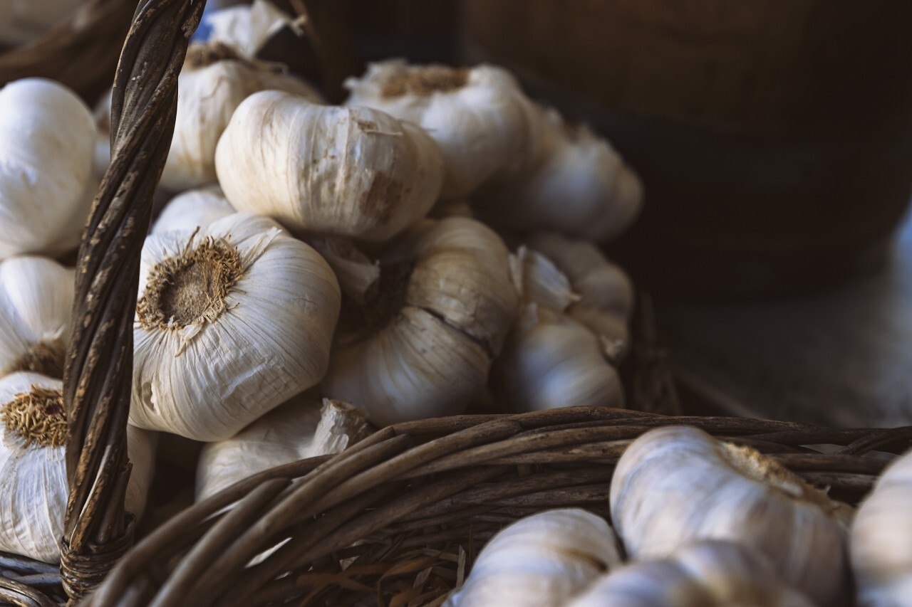 garlic cloves in baskets