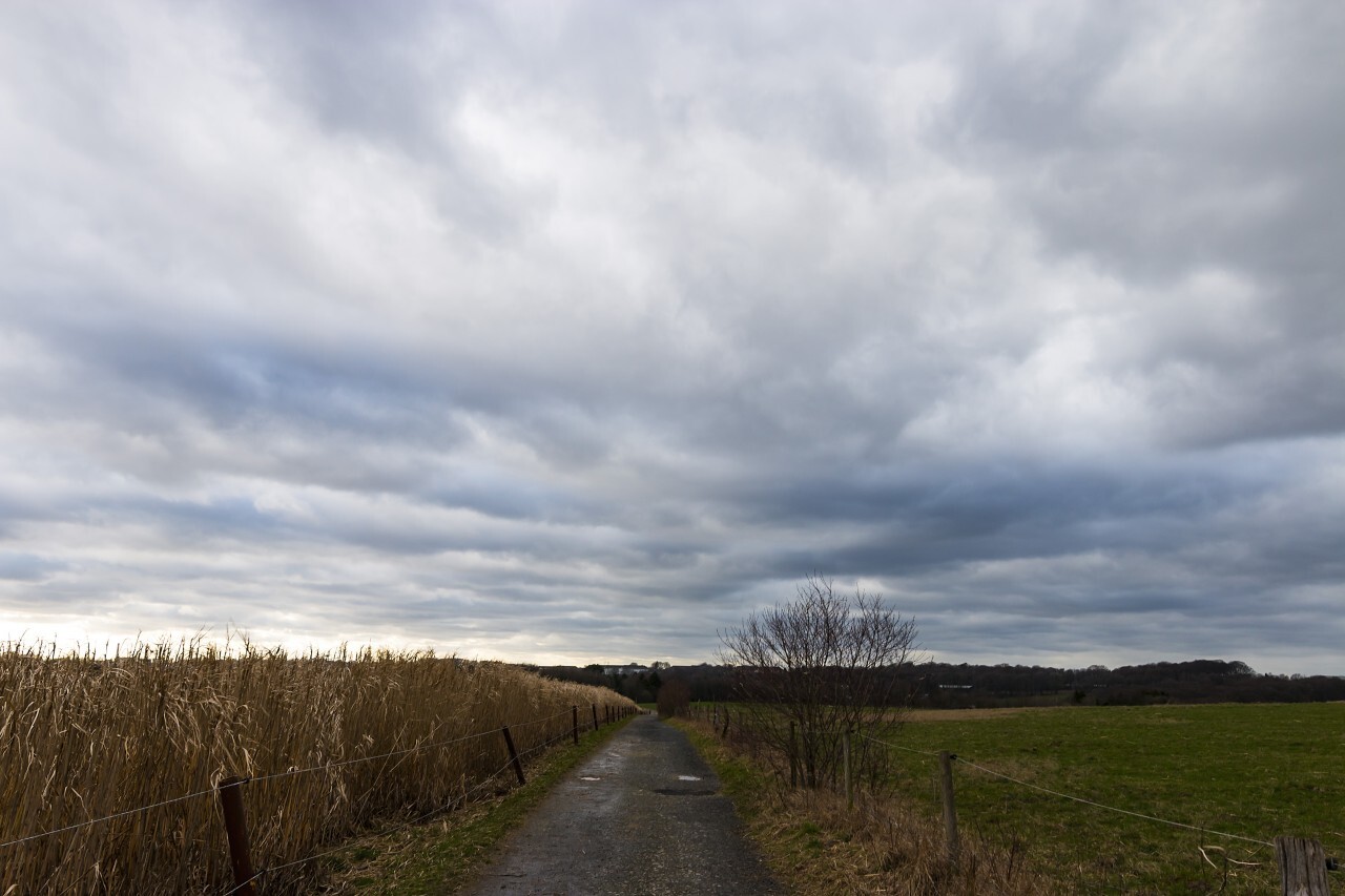 storm clouds over fields