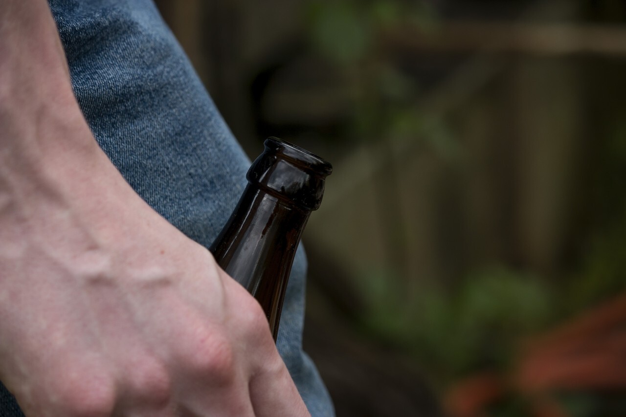 beer bottle in hand