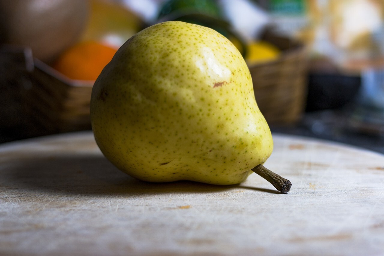 pear on a wooden board