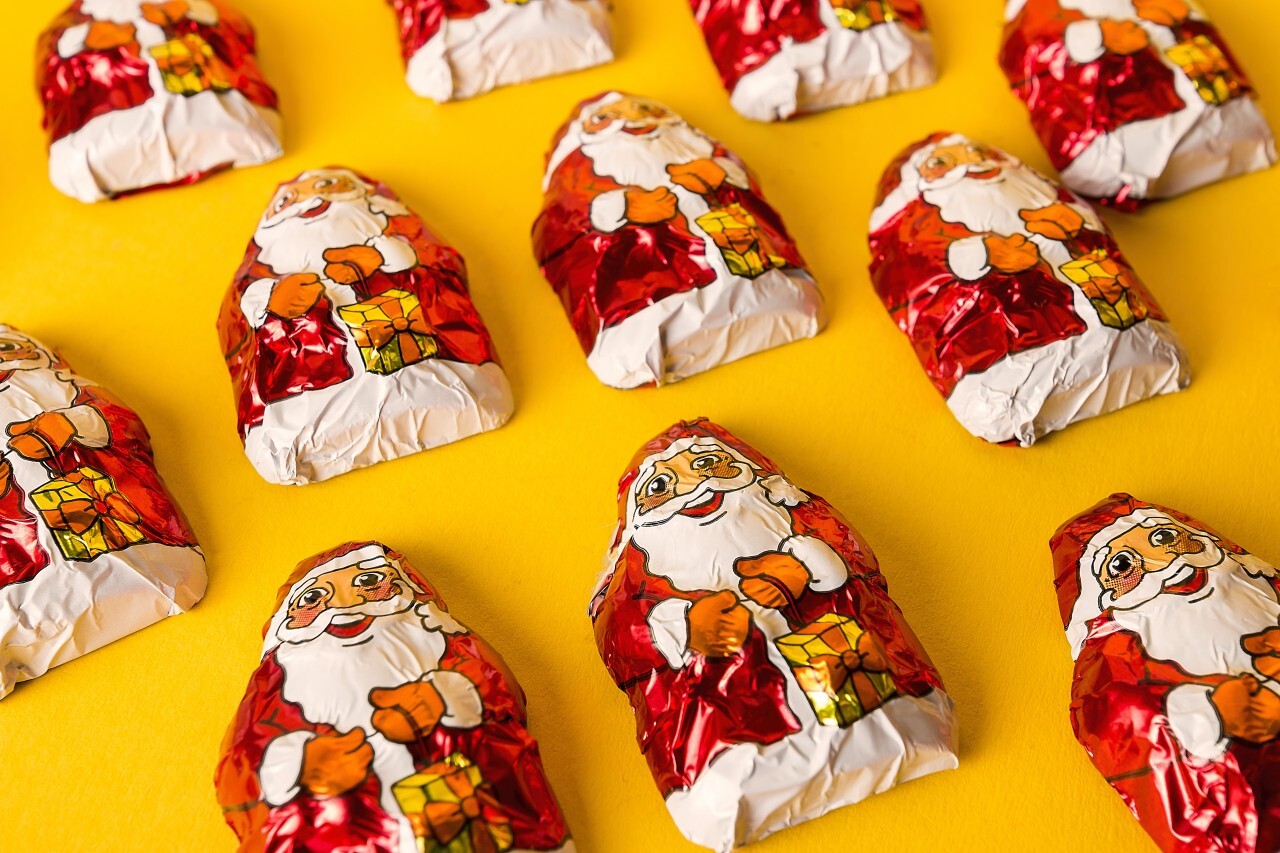 chocolate santas on a yellow background