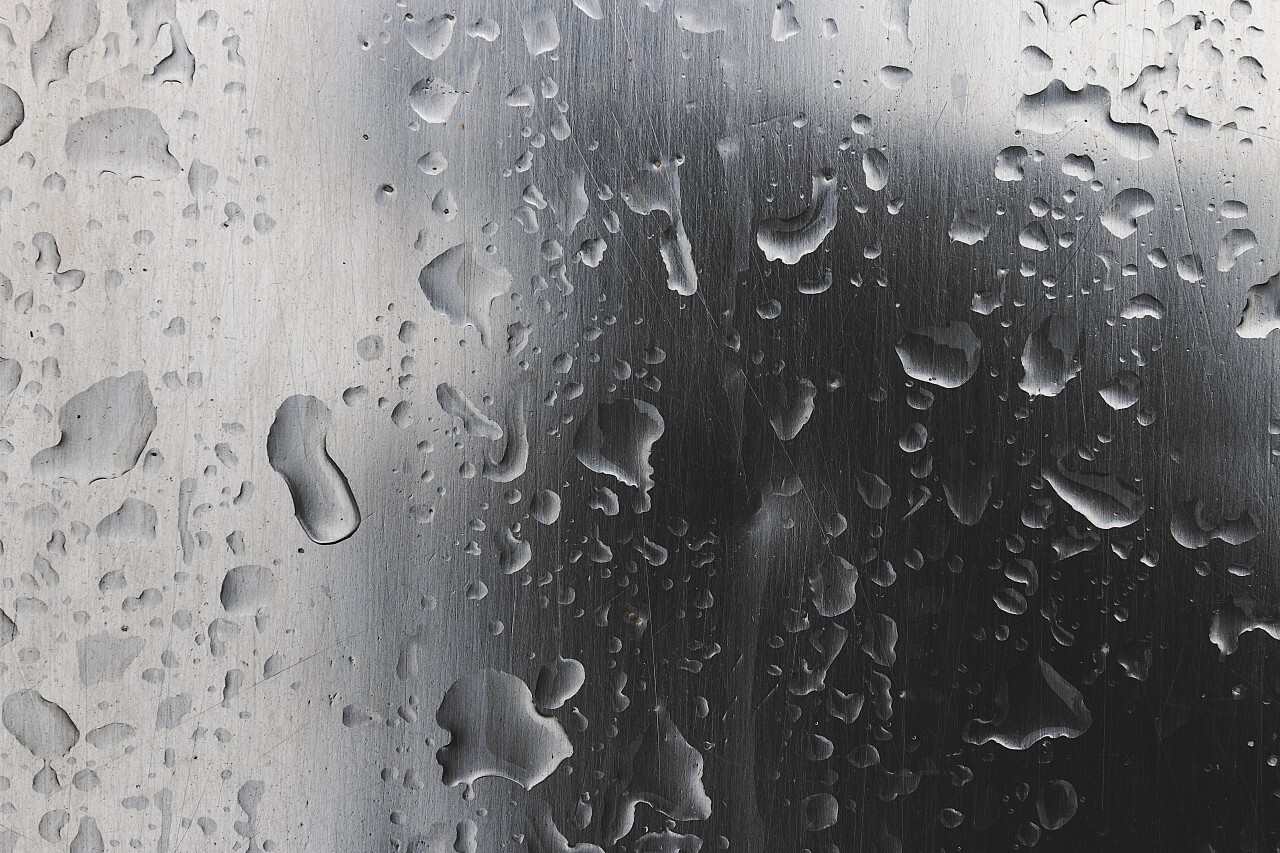 polished wet steel raindrops background texture