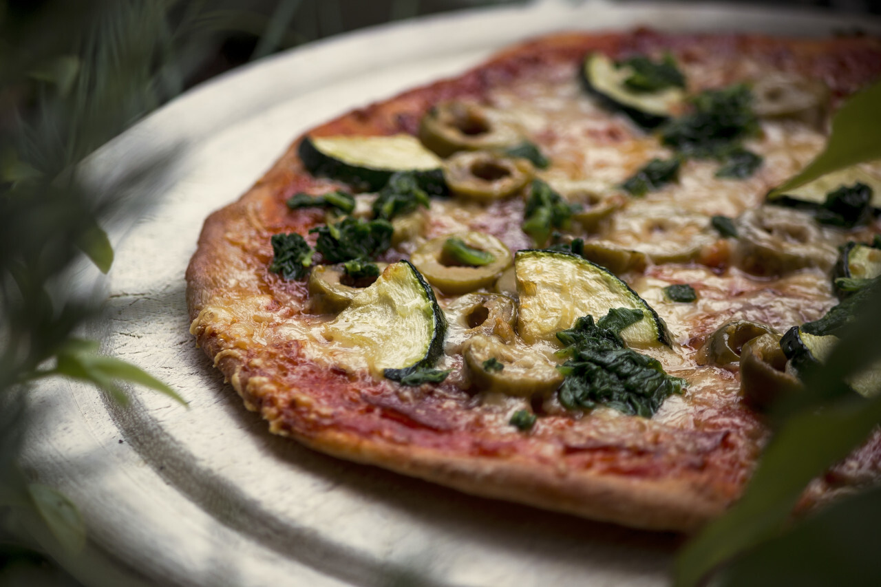 pizza with zucchini spinach olives