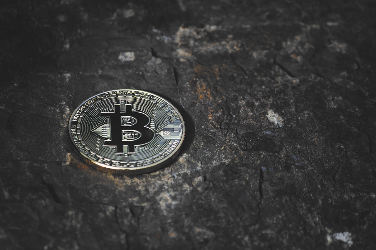 bitcoin on dark stone background