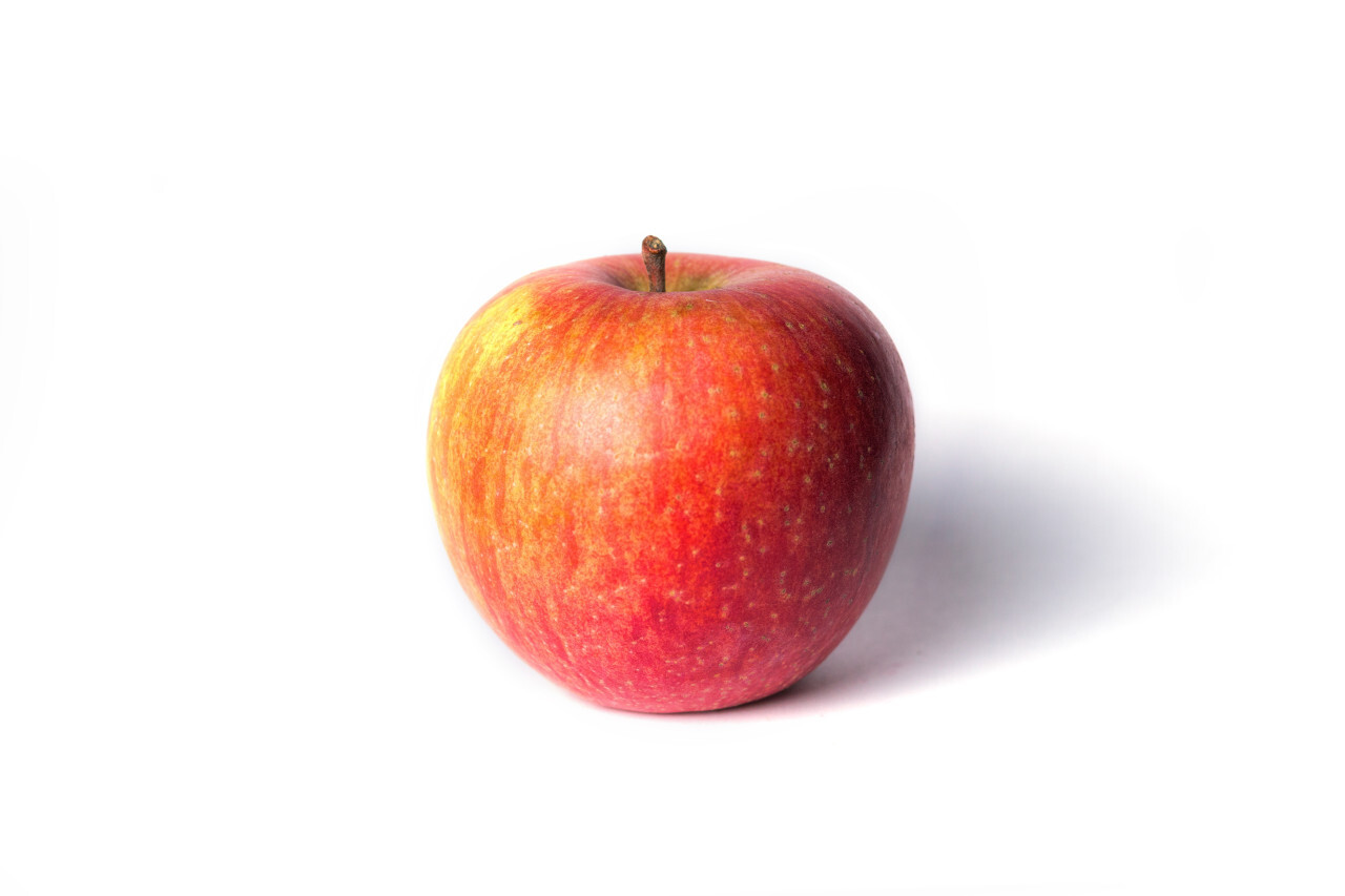 Fresh red apple isolated on white background