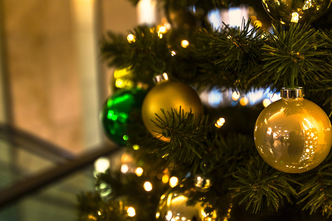 christmas tree with golden balls in a shopping mall