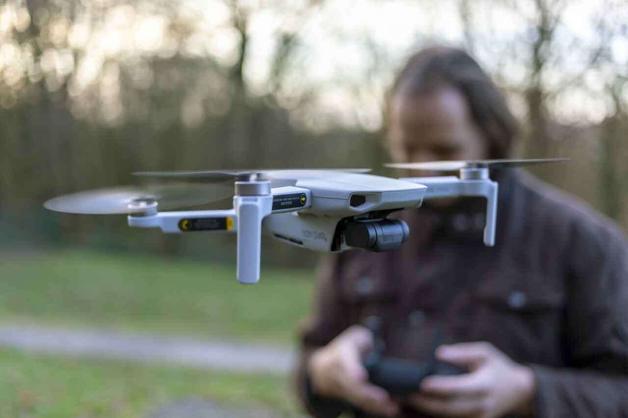 Quadrocopter drone flying in the sky