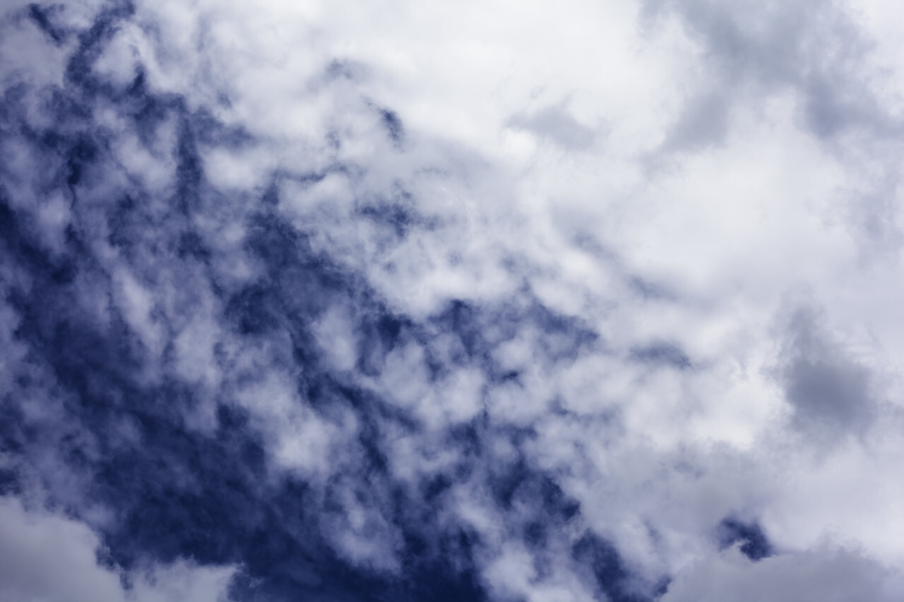 clouds with dark blue sky