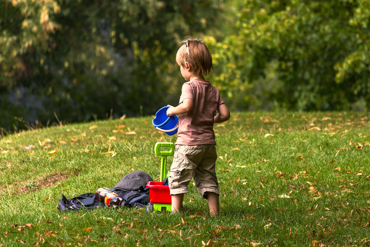 little child with bucket