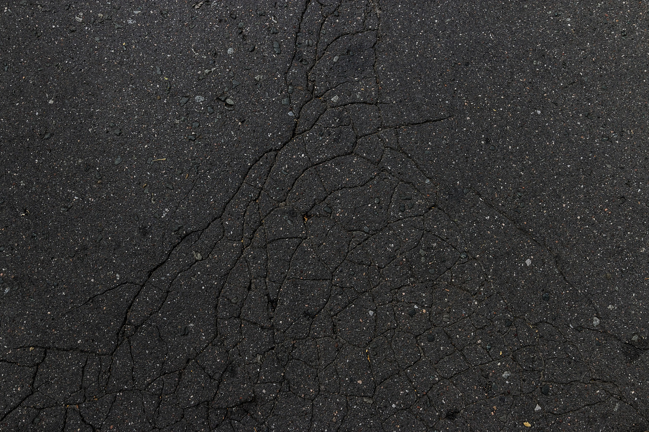 asphalt texture with big cracks
