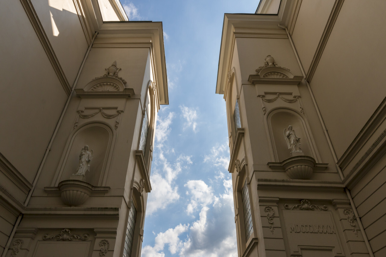 beautiful building with angels stucco