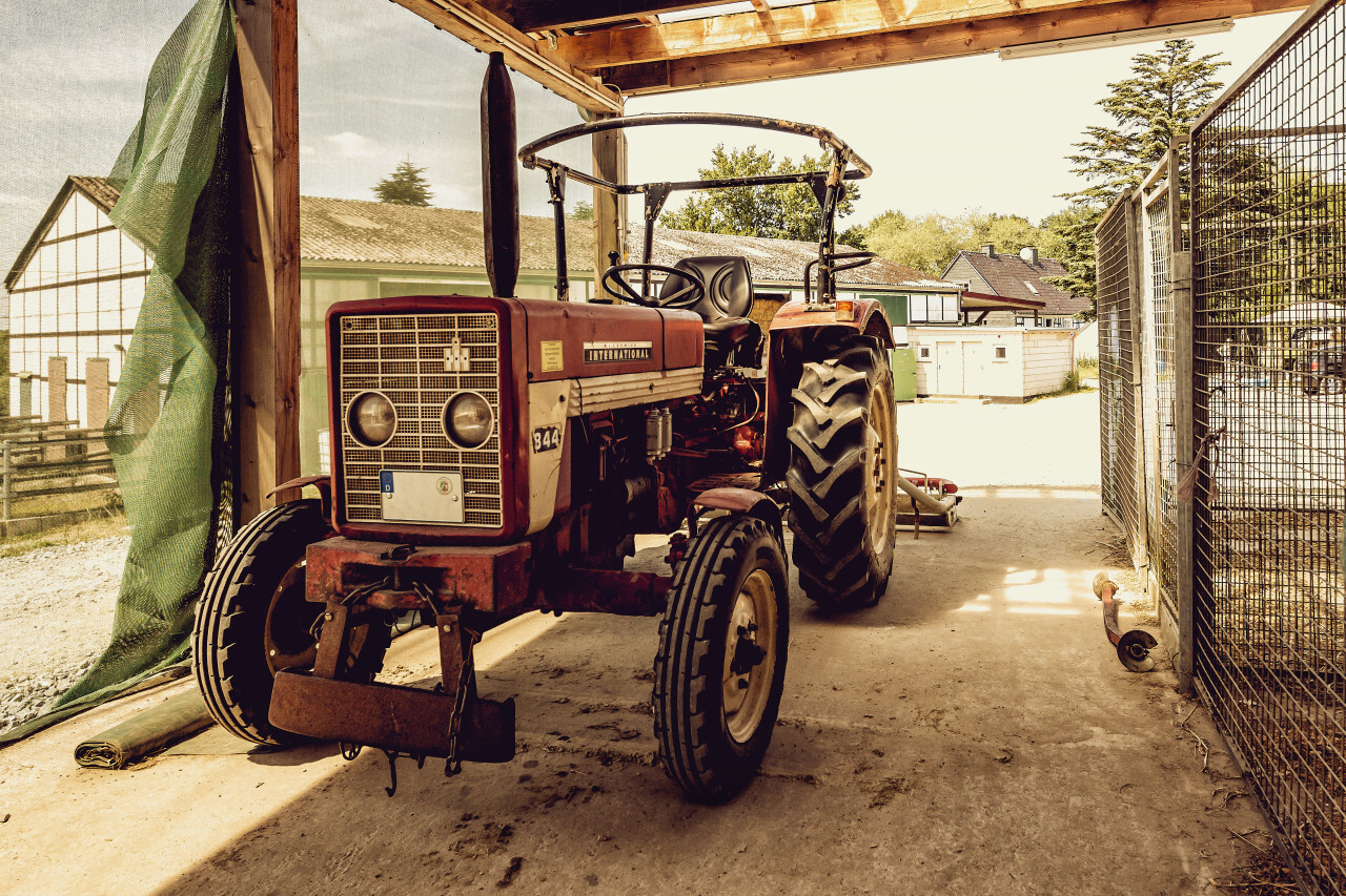 old vintage tractor on a farm