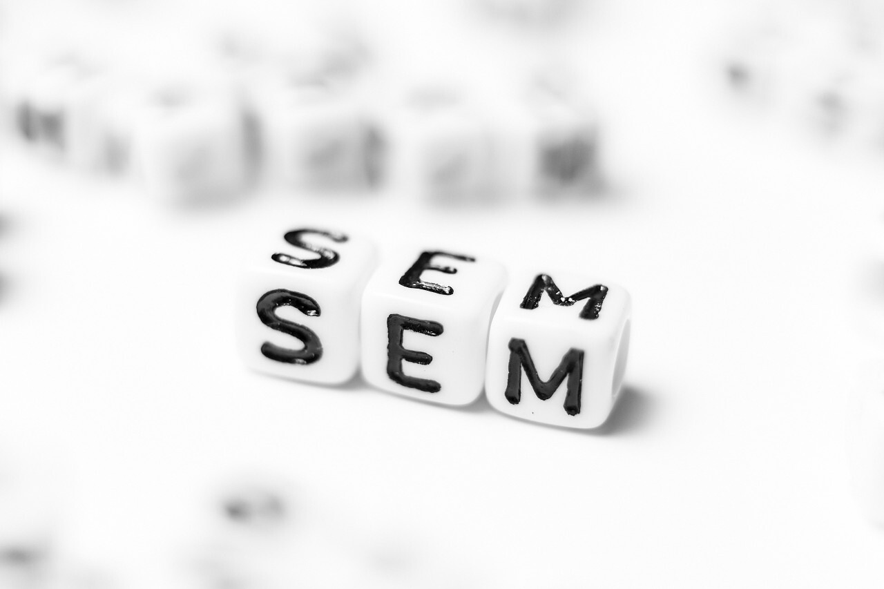 SEM as a word - bright dice font concept