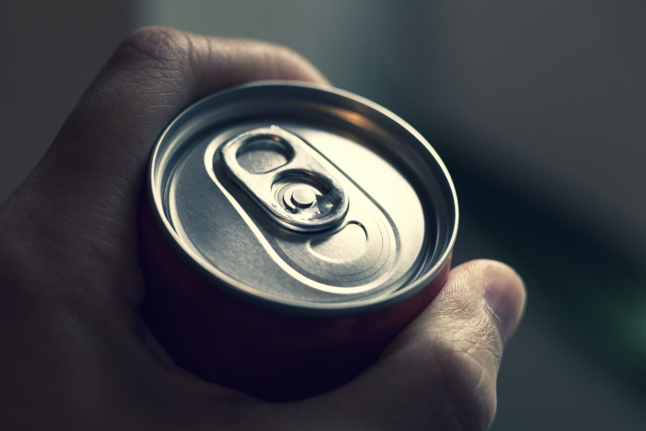 drink can - cola can in a hand softdrinks