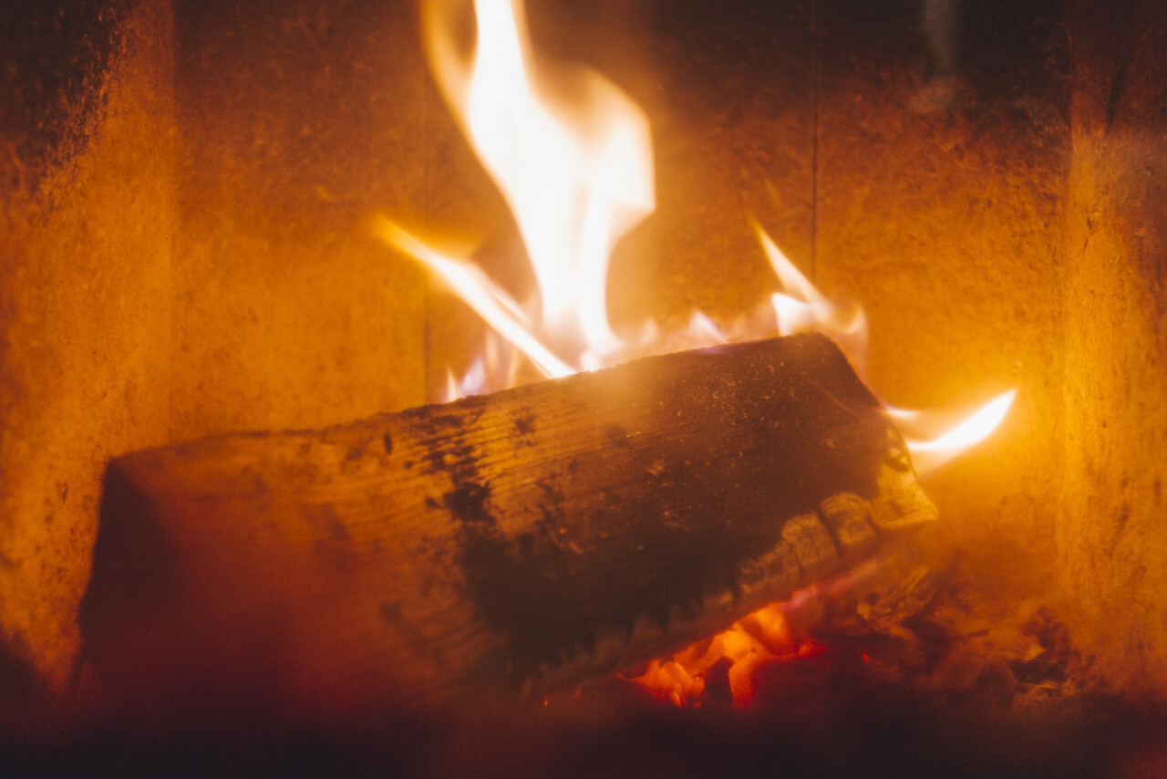 burning firewood in the fireplace