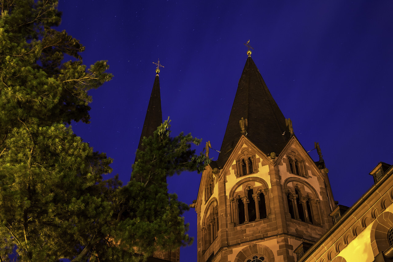 Church at night under stars - Marienkirche by Gelnhausen, Frankfurt am Main in Germany