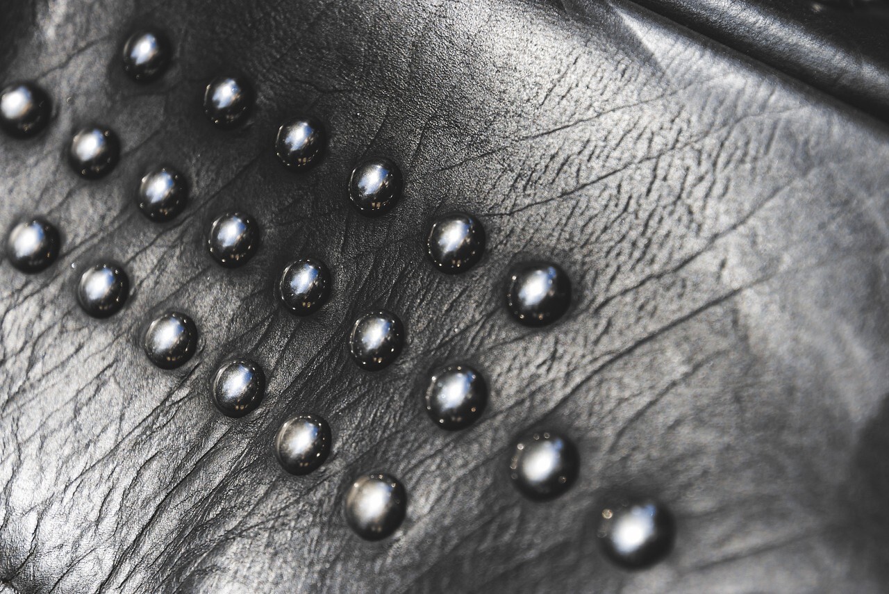 black leather with rivets
