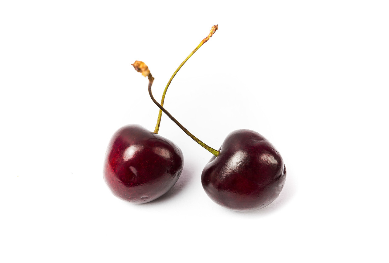 two cherries isolated on white background