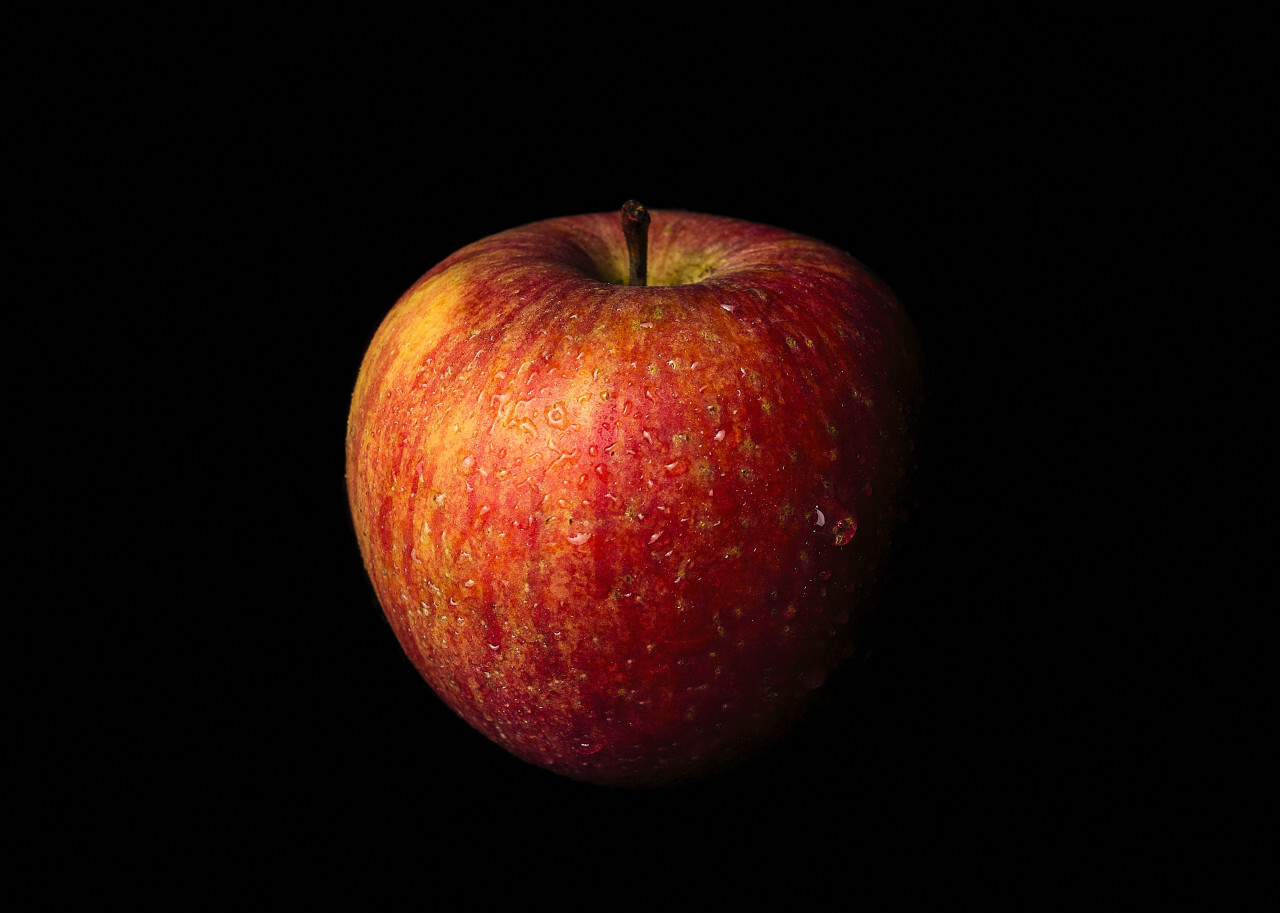 apple isolated on black background