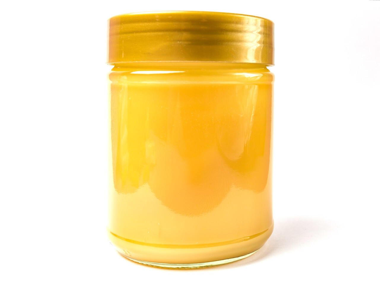 honey jar isolated on white background