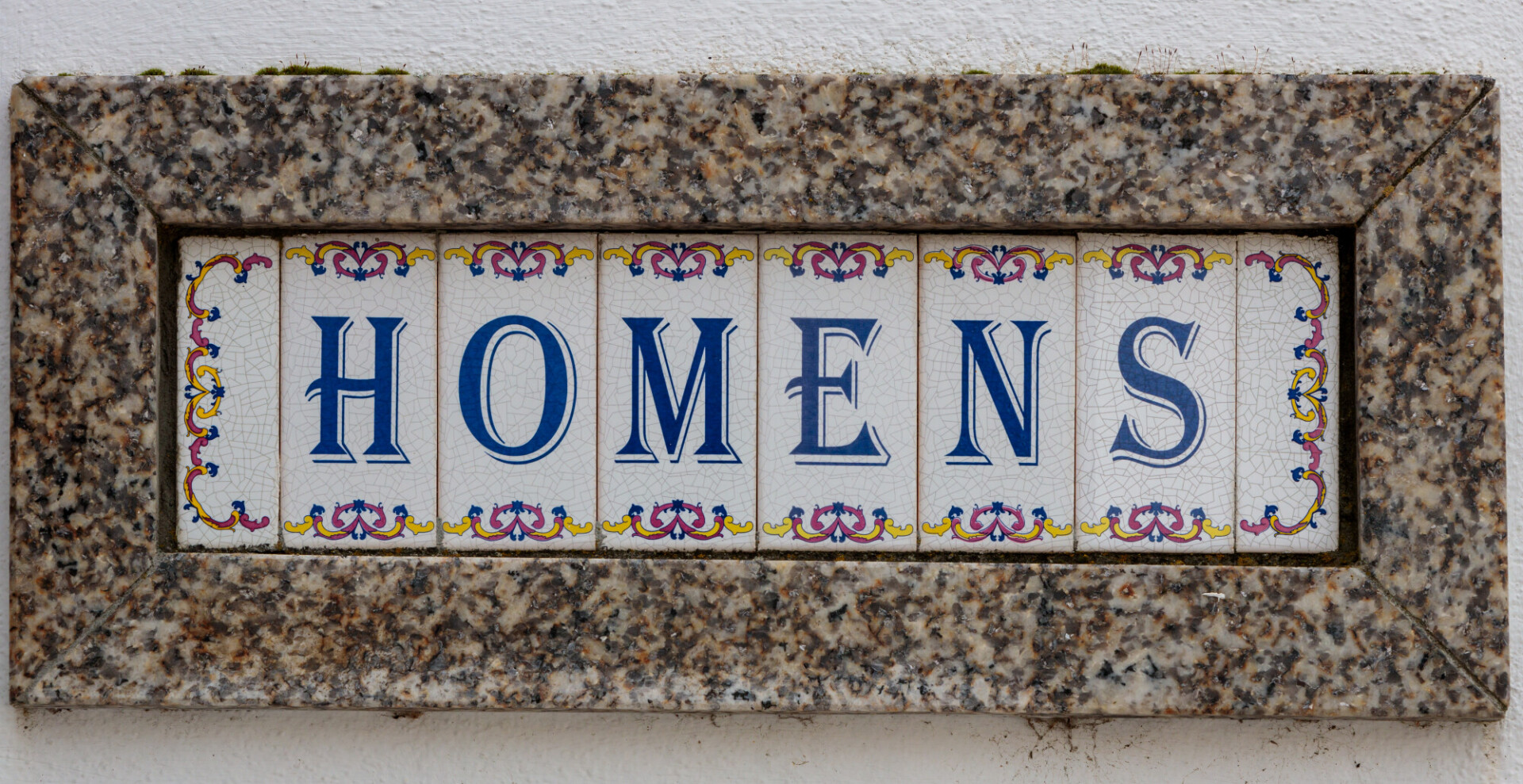 Homens Sign