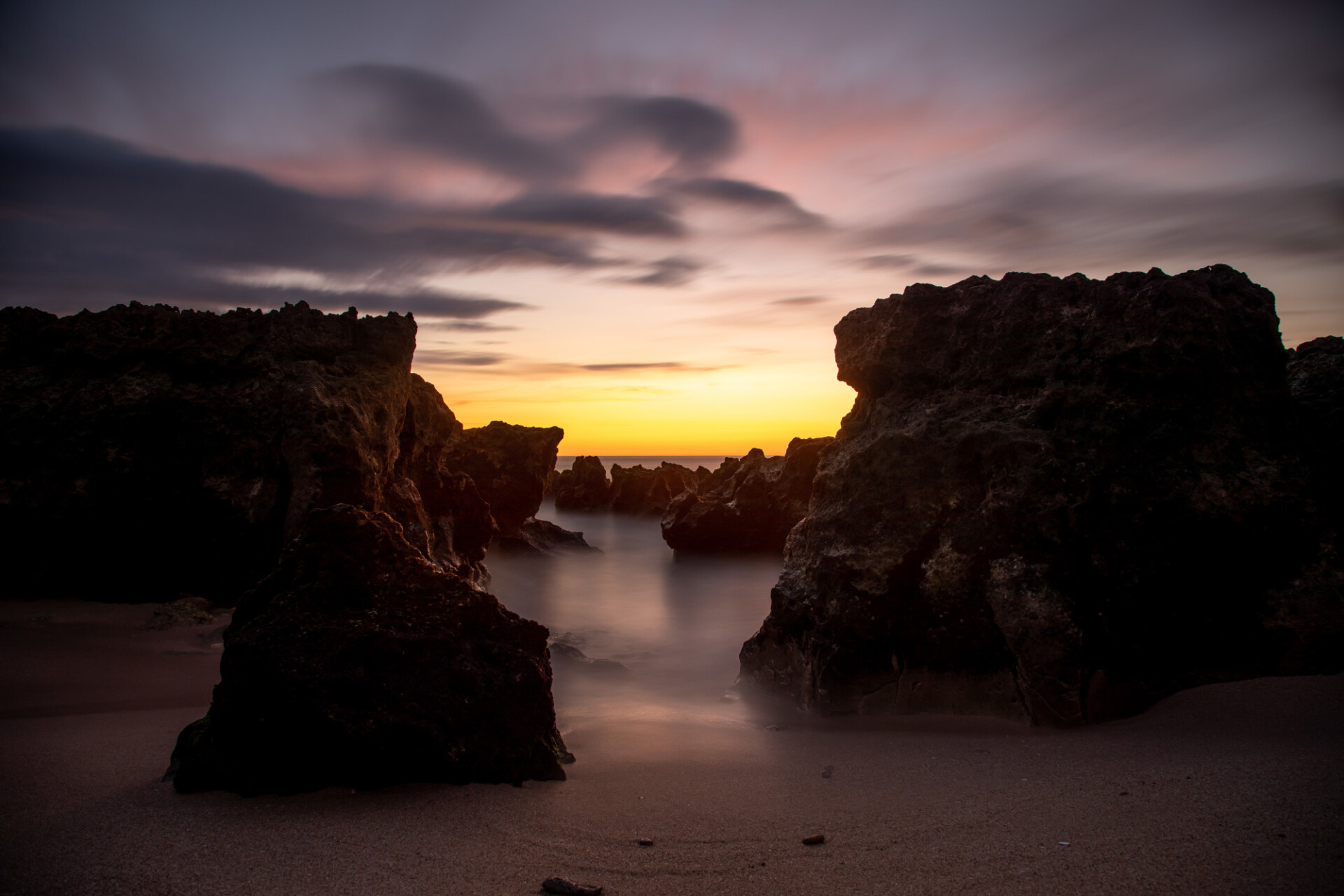 Wonderful sunset on the cliff-rich beach of Portugal Seascape