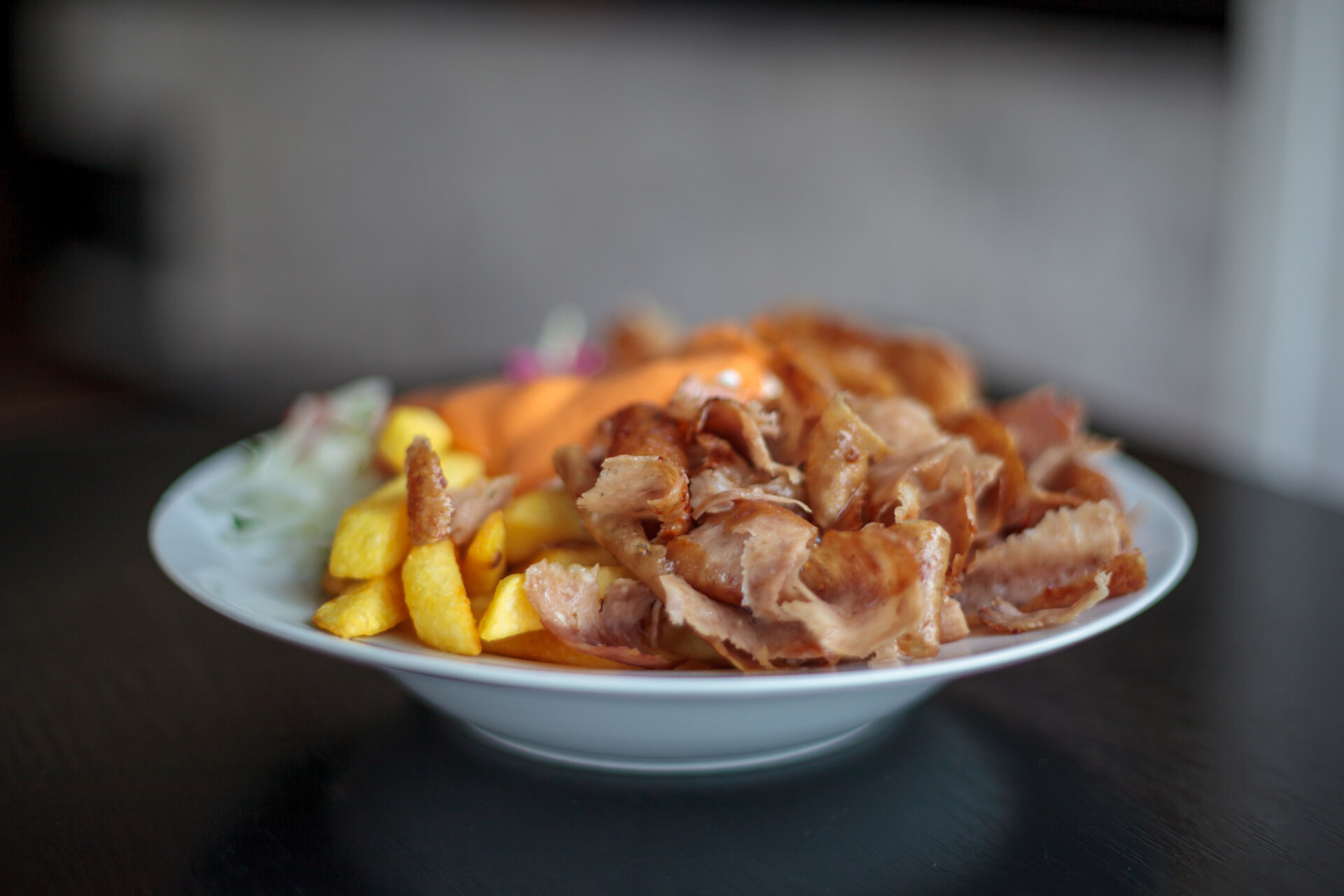 kebab and french fries on a plate