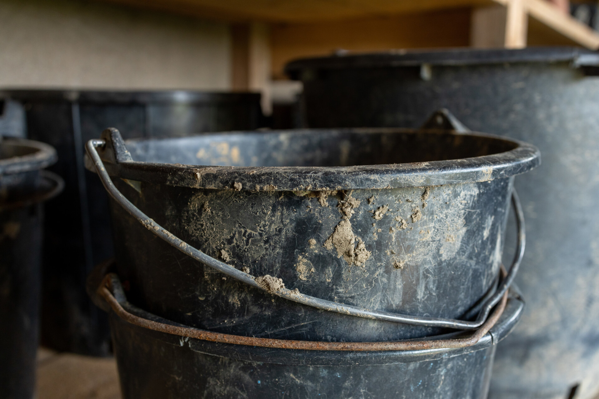 Black bucket on a construction plate