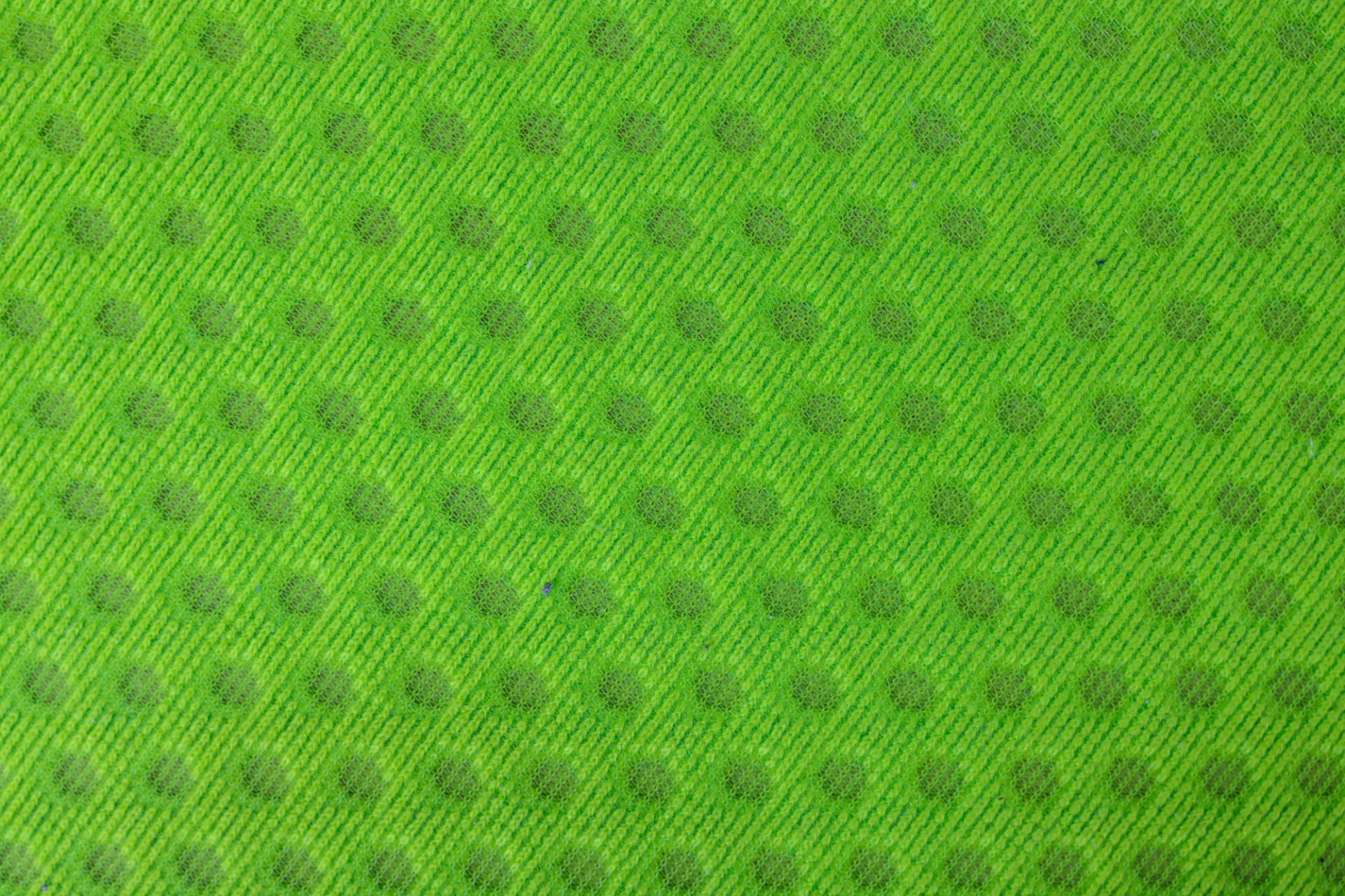 Green dotted fabric texture