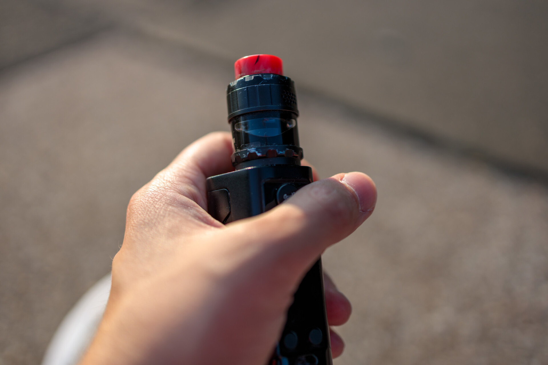 E-cigarette in hand