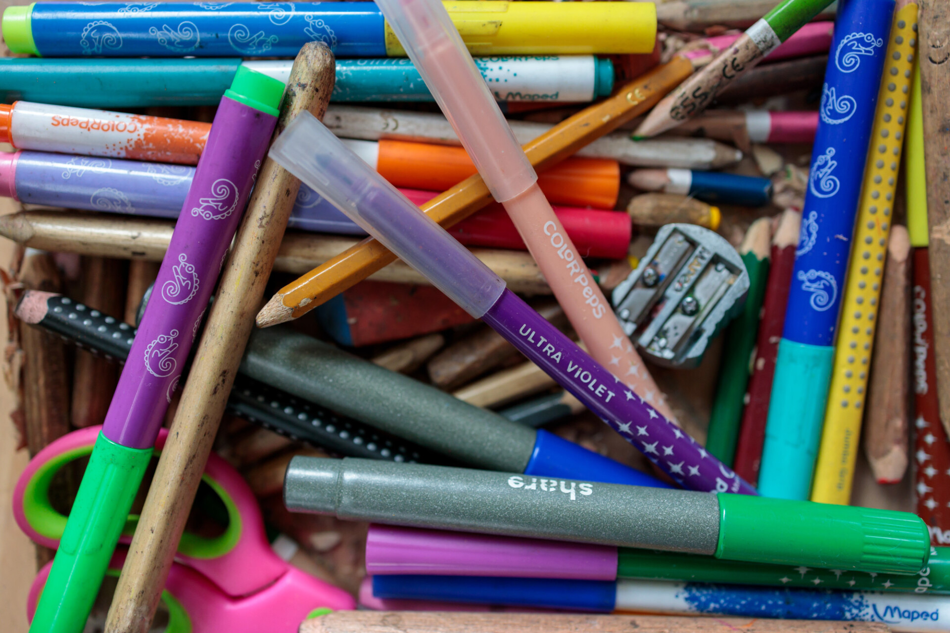 Various coloured pencils in a box