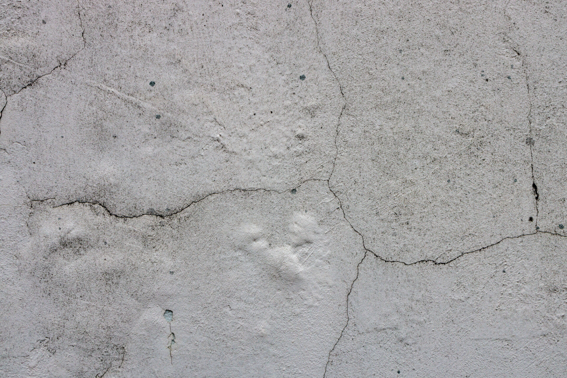 White wall weathered and with cracked texture