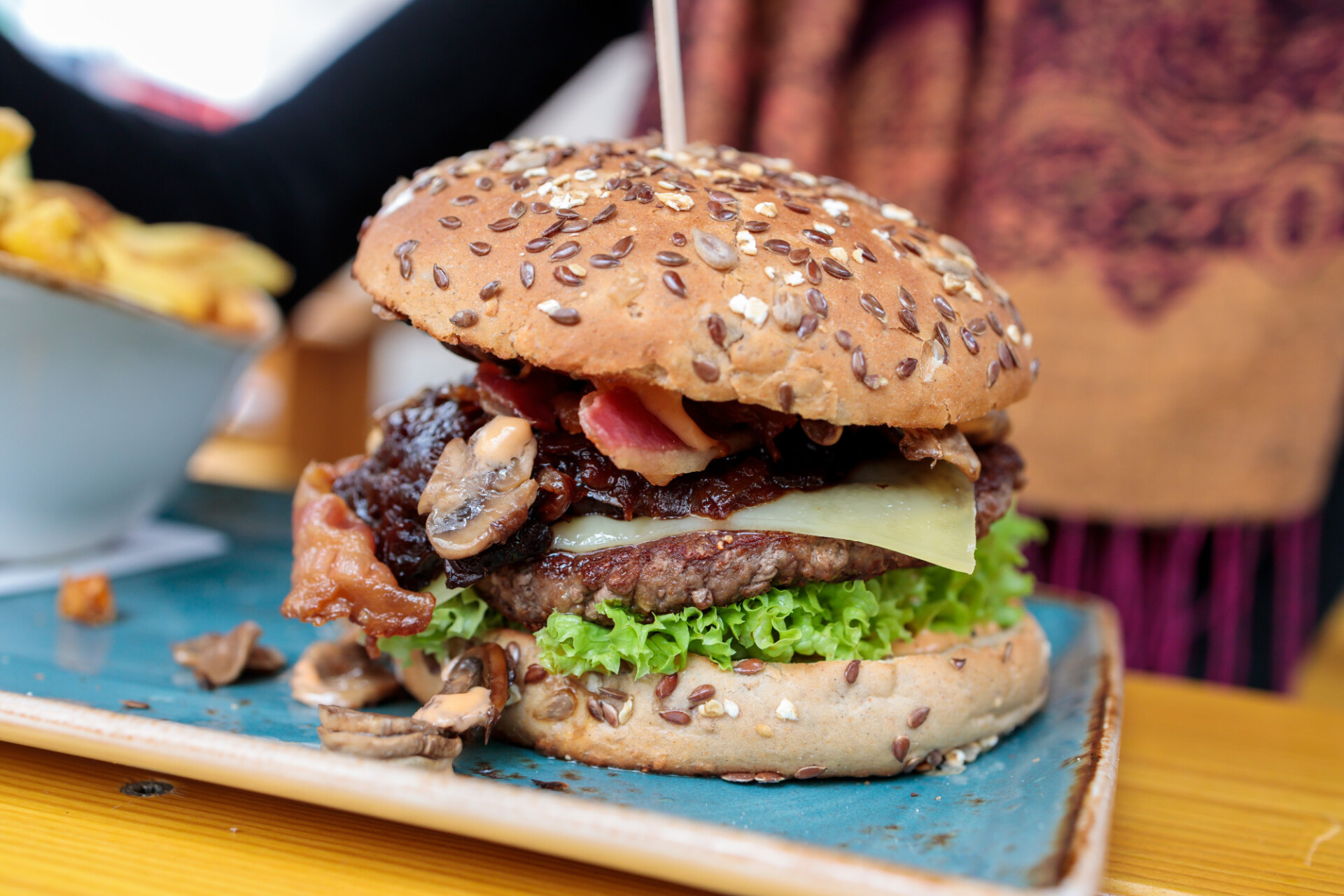 Hamburger with cheese and pickled onions