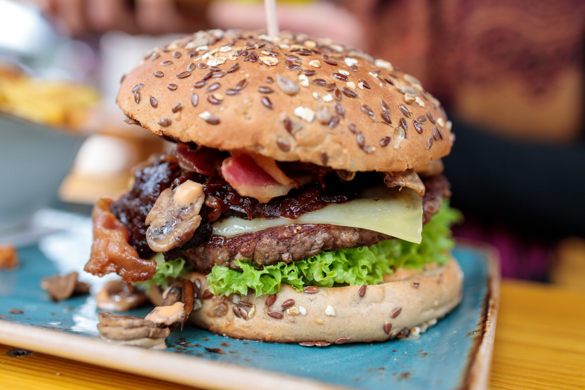 Hamburger with onions cheese and mushrooms