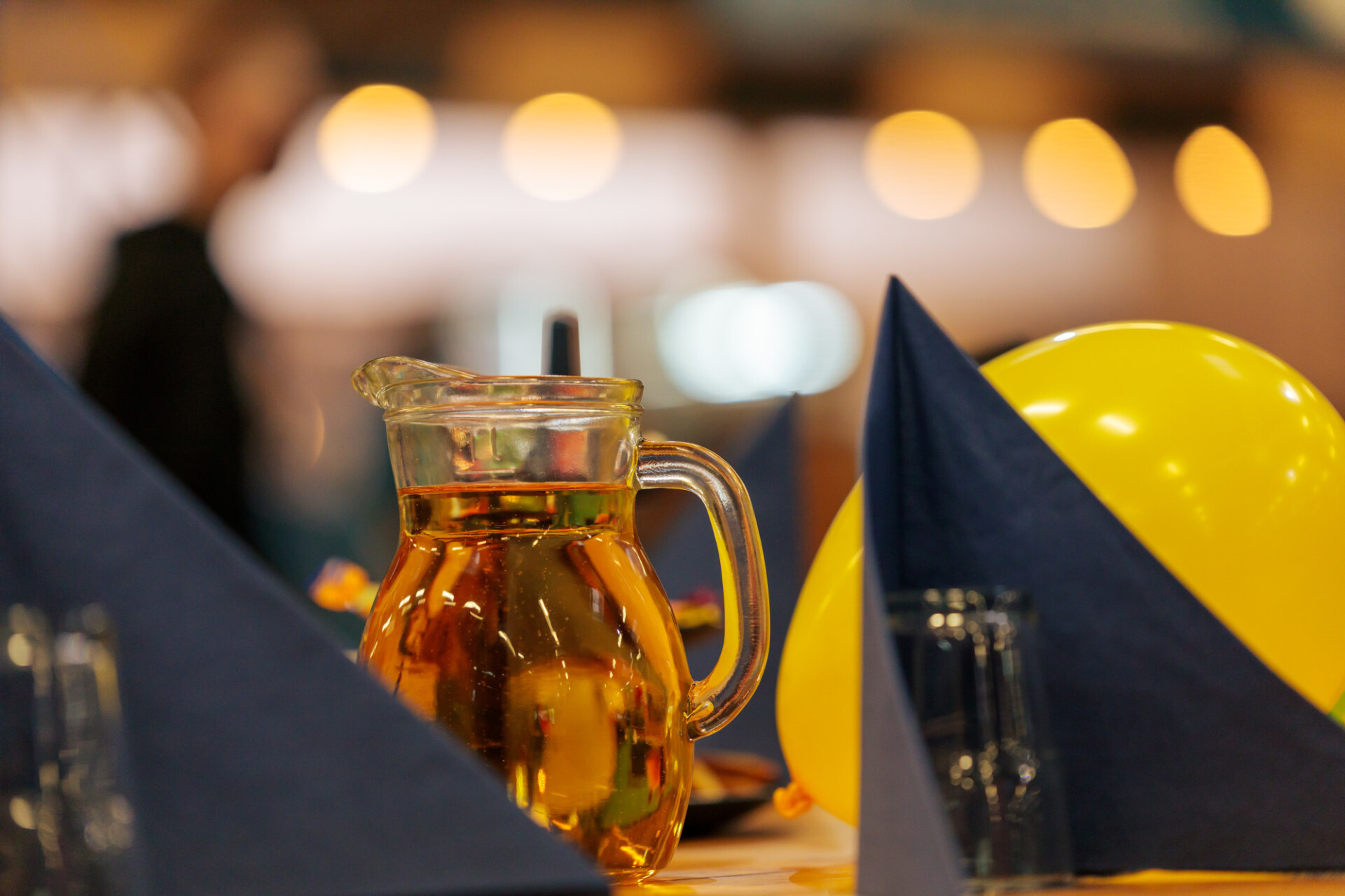 Glass jug with apple juice