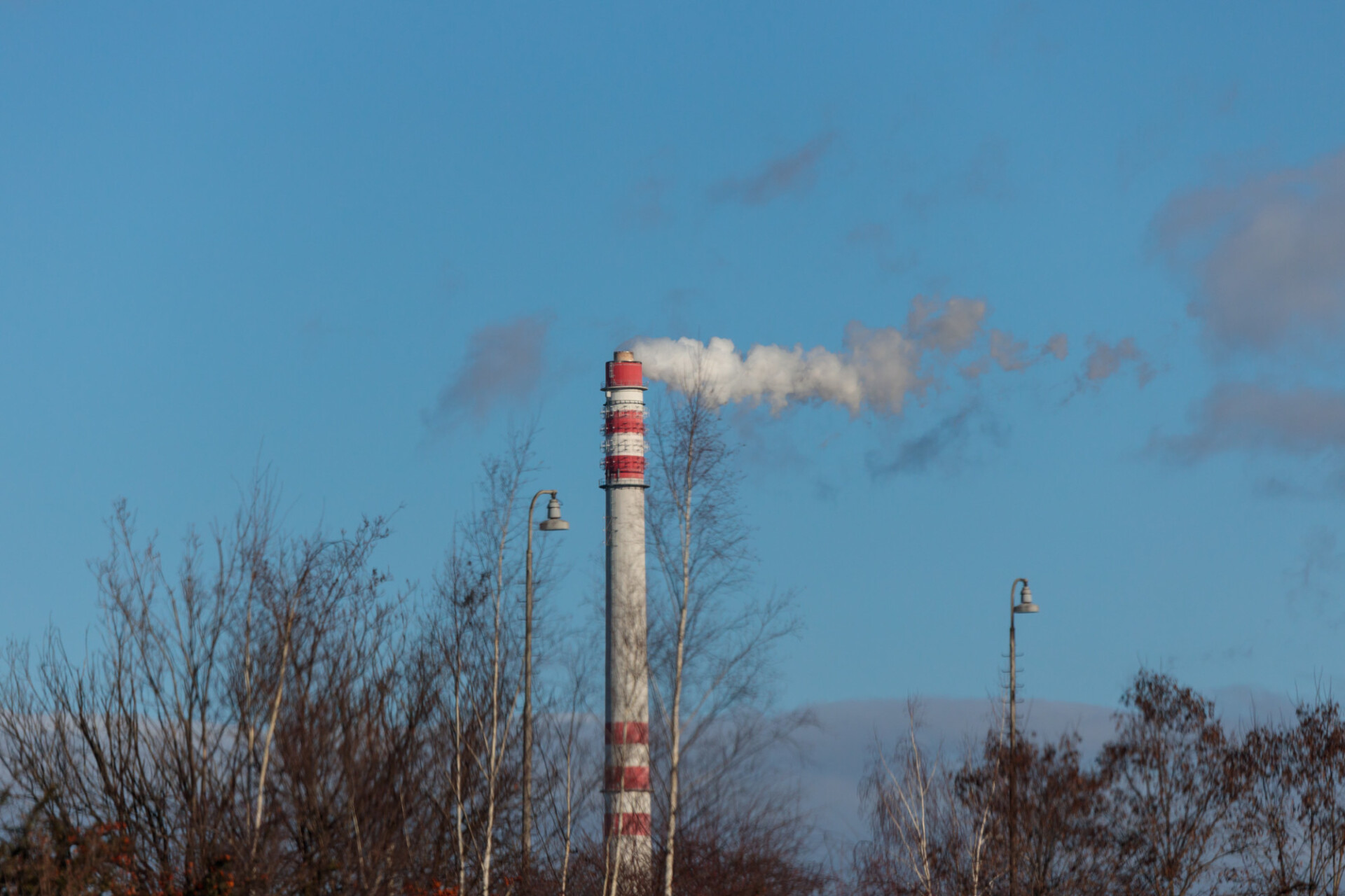 Industry Chimney from which smoke is blown out