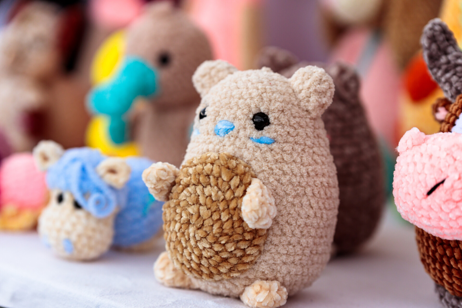 Adorable Handcrafted Delight: Crocheted Hamster at a Handmade Market