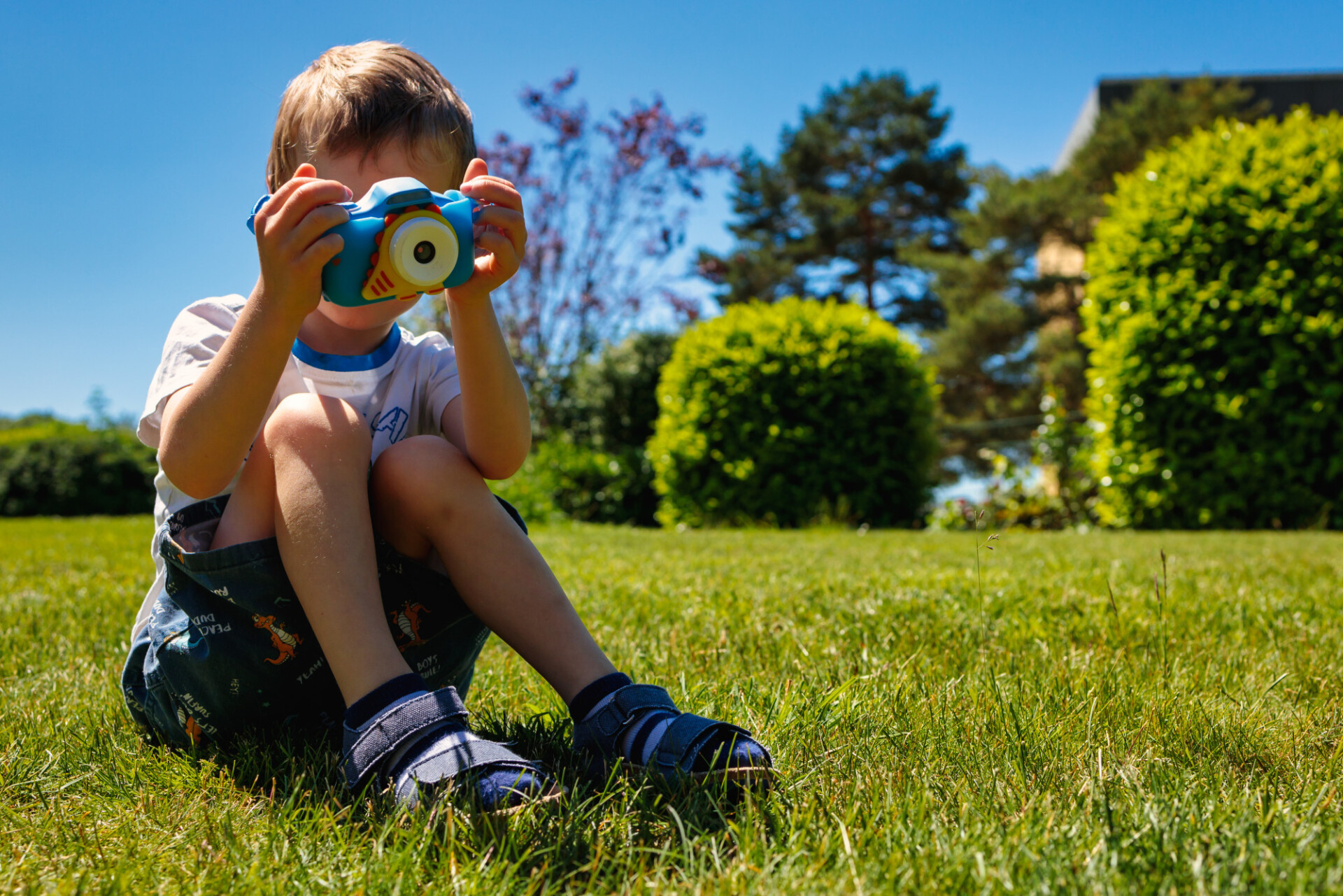 Small child with child camera