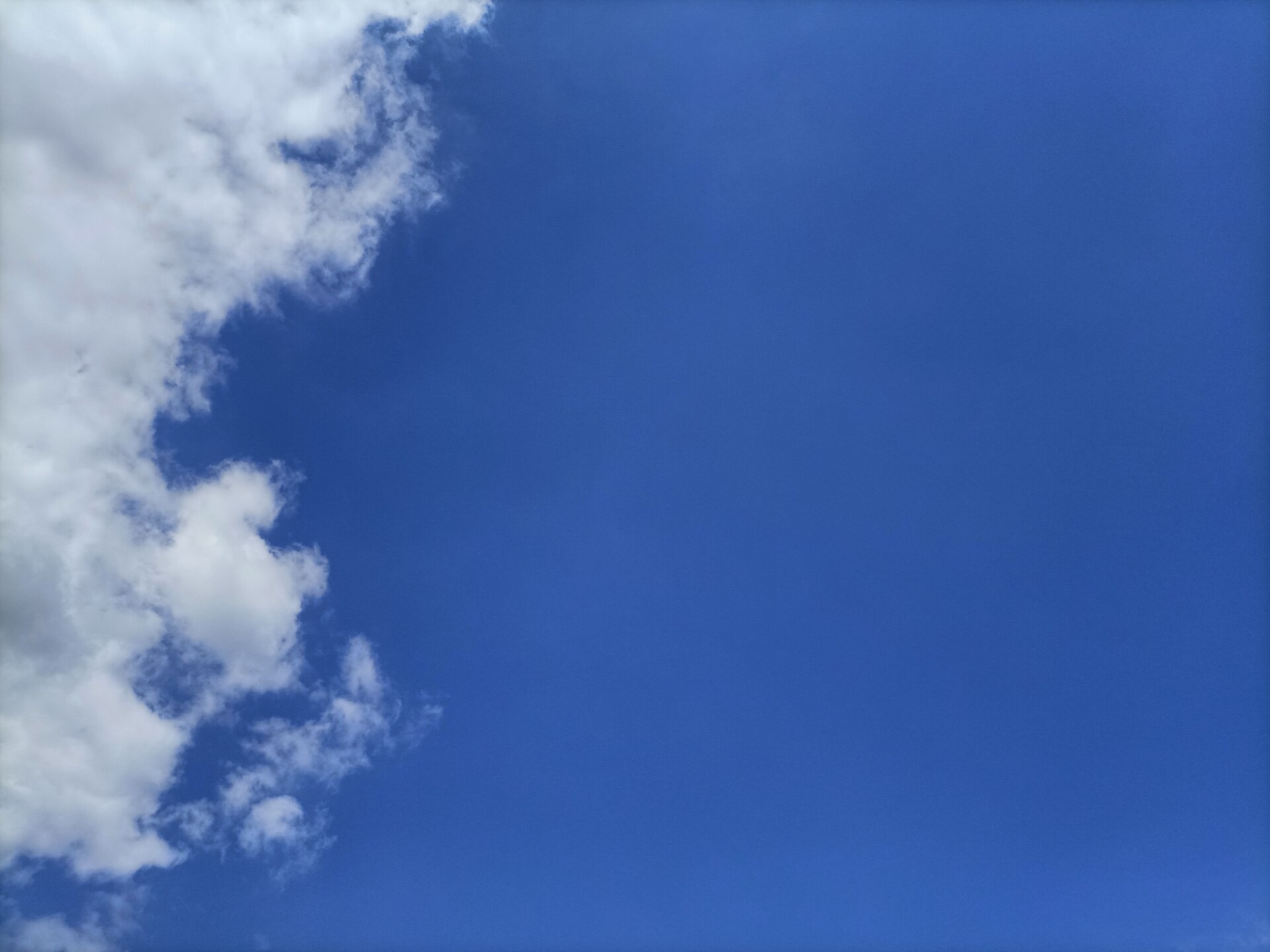 Blue Sky wit a cloud on the left