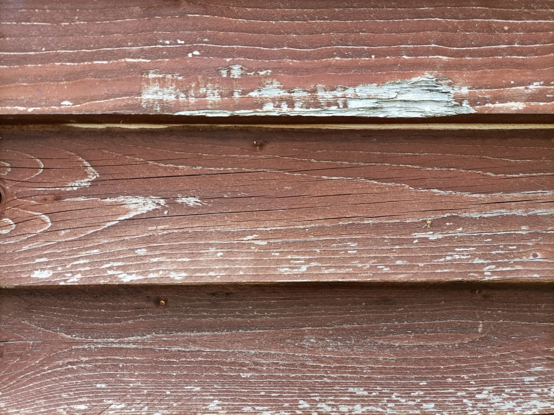 Reddish wood planks wall texture