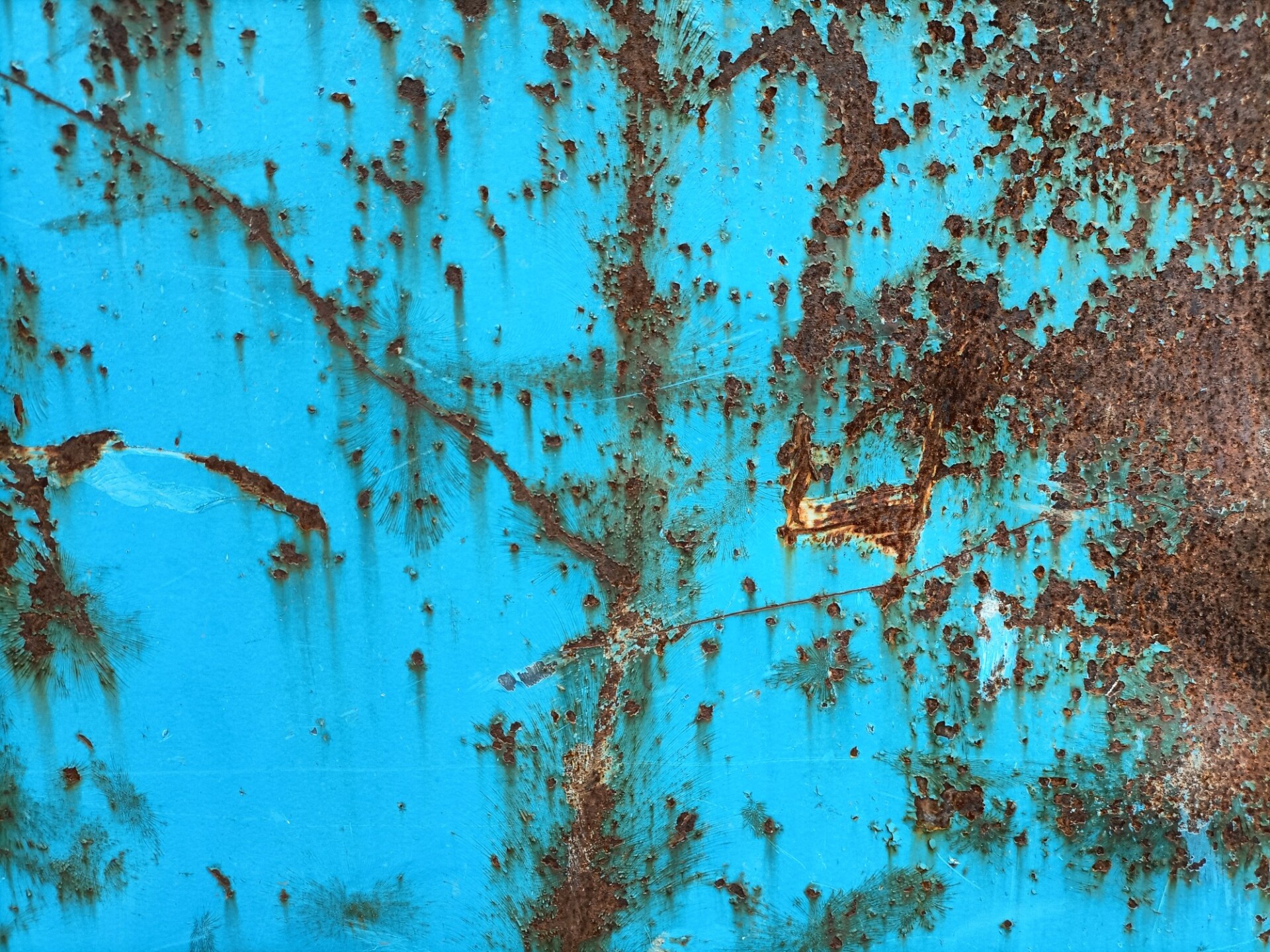 Scratched blue metal background texture