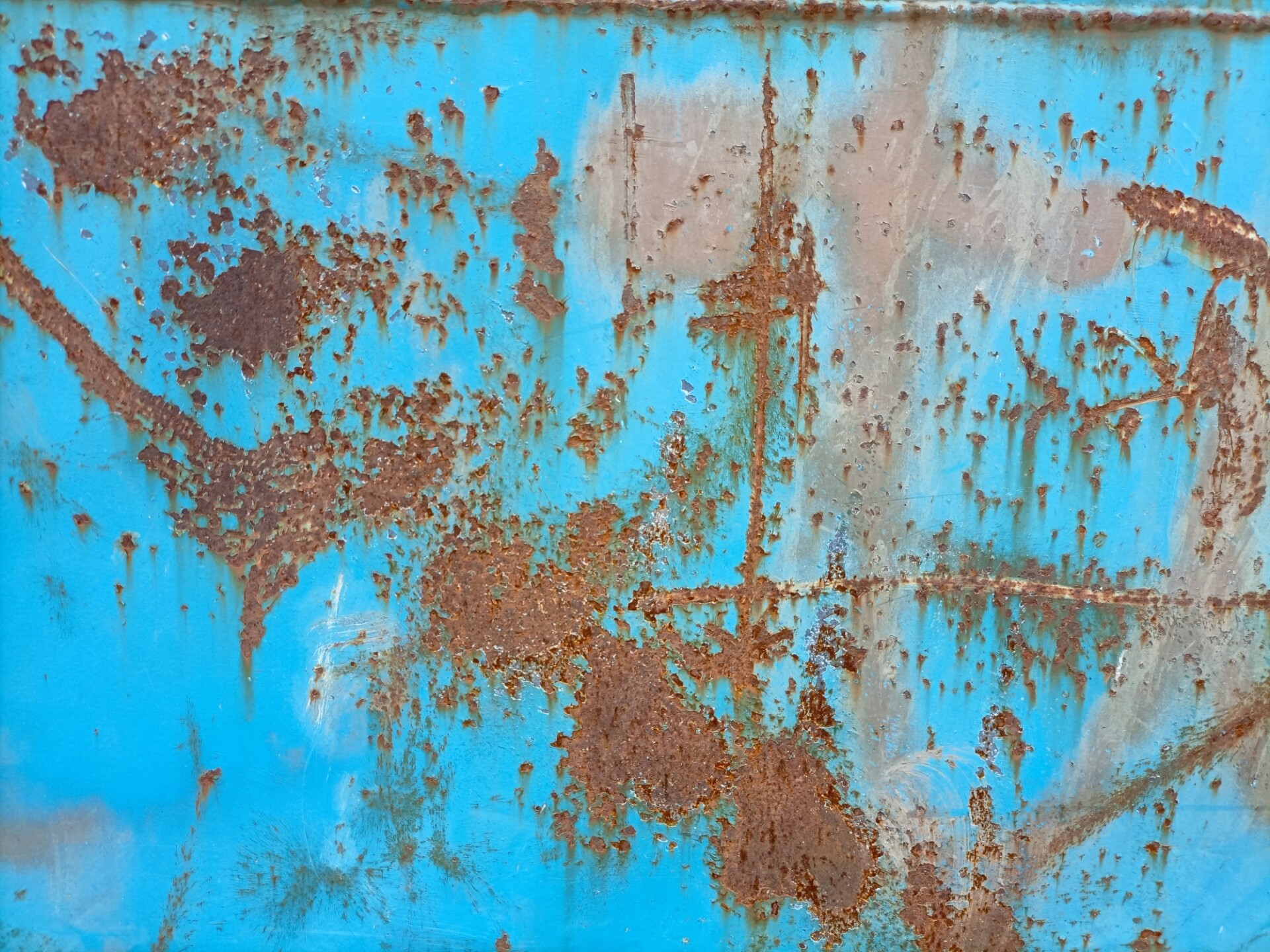 scratched and rusty blue metal texture