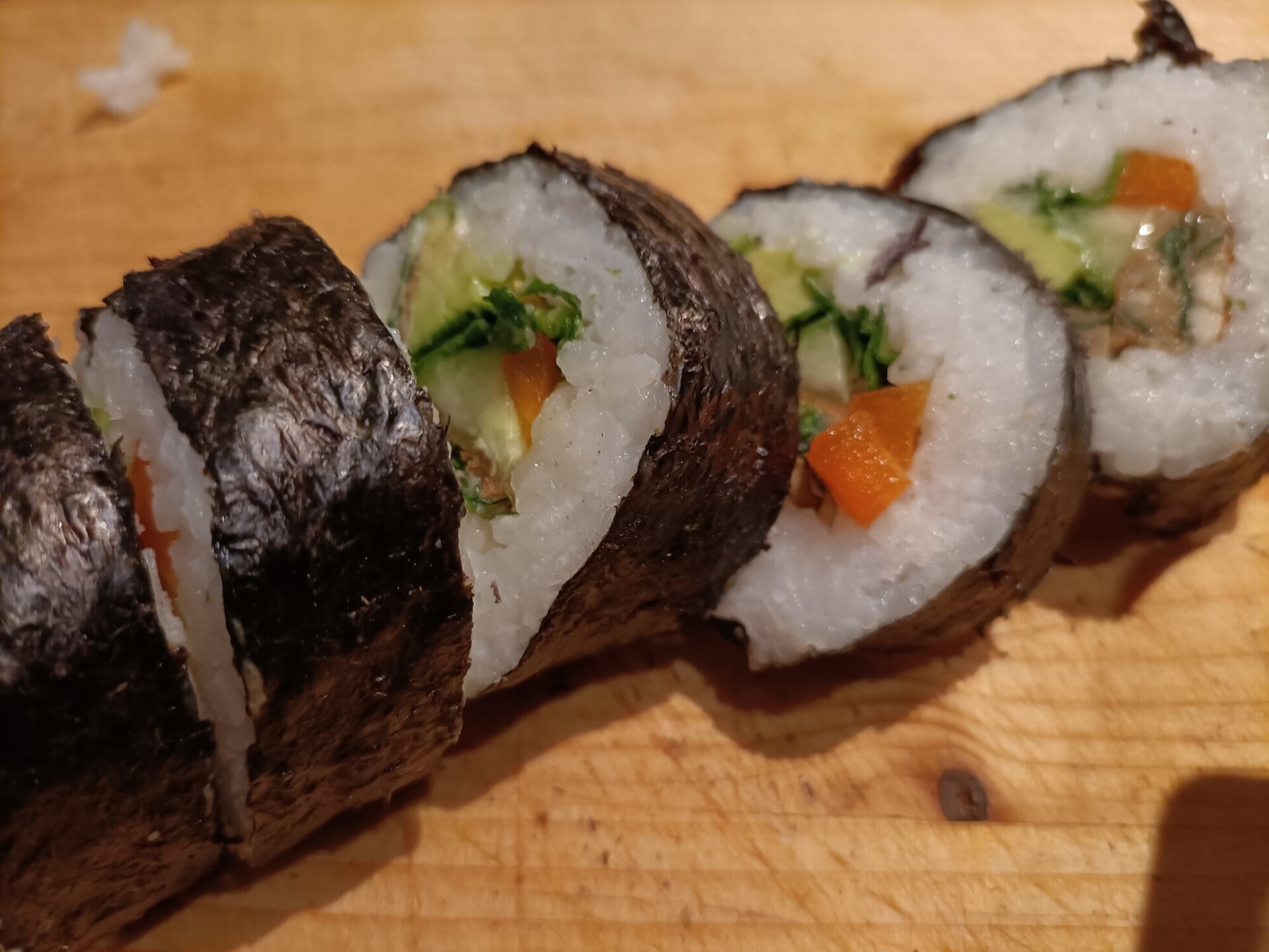 Sushi Delight Artfully Plated on a Wooden Board