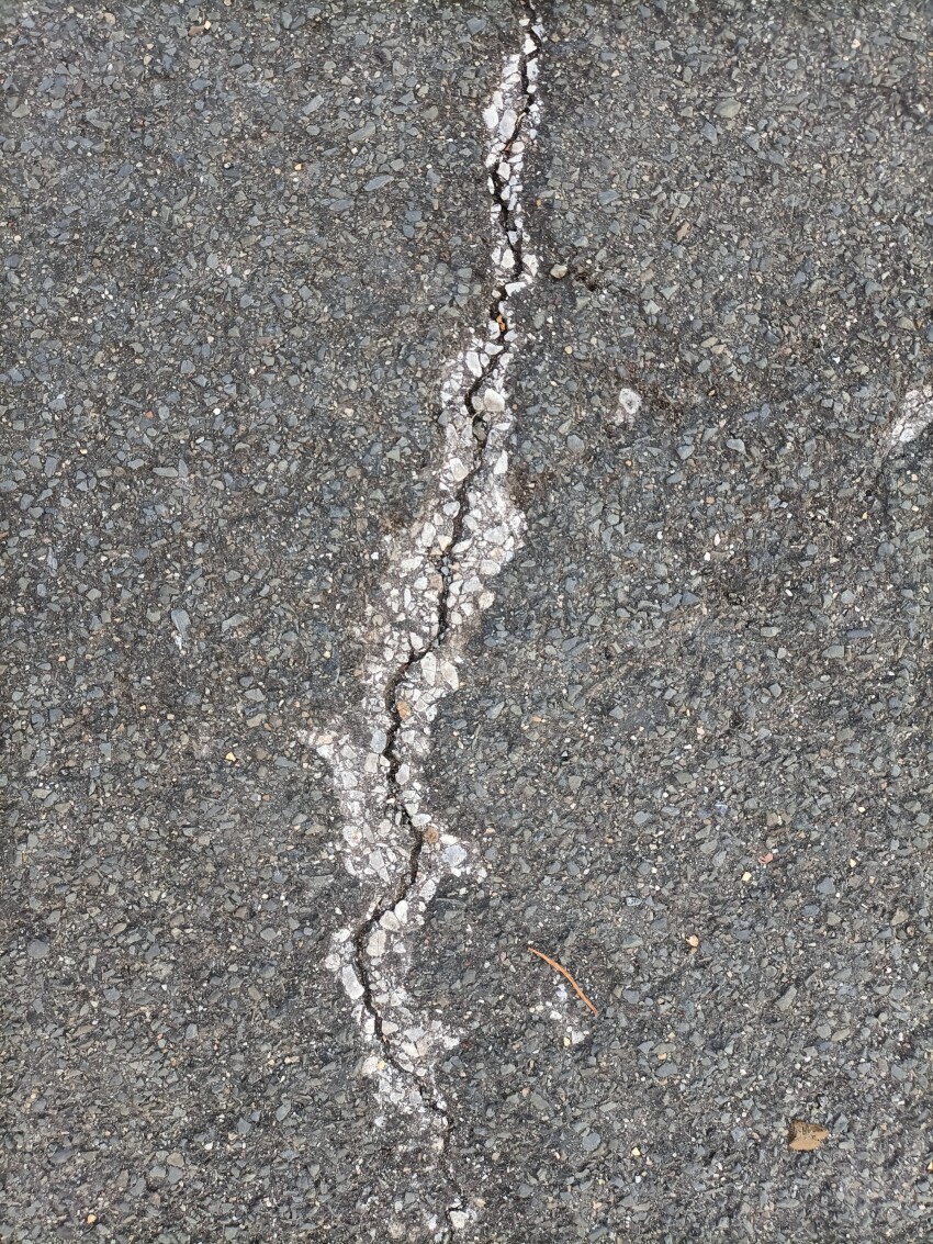 Street texture with a huge crack
