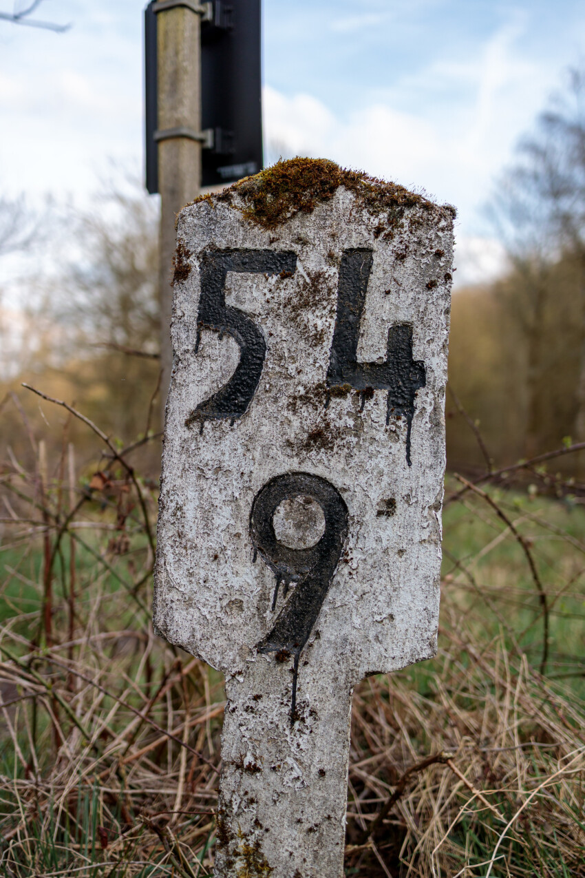 Old train sign with the numbers 54 and 9