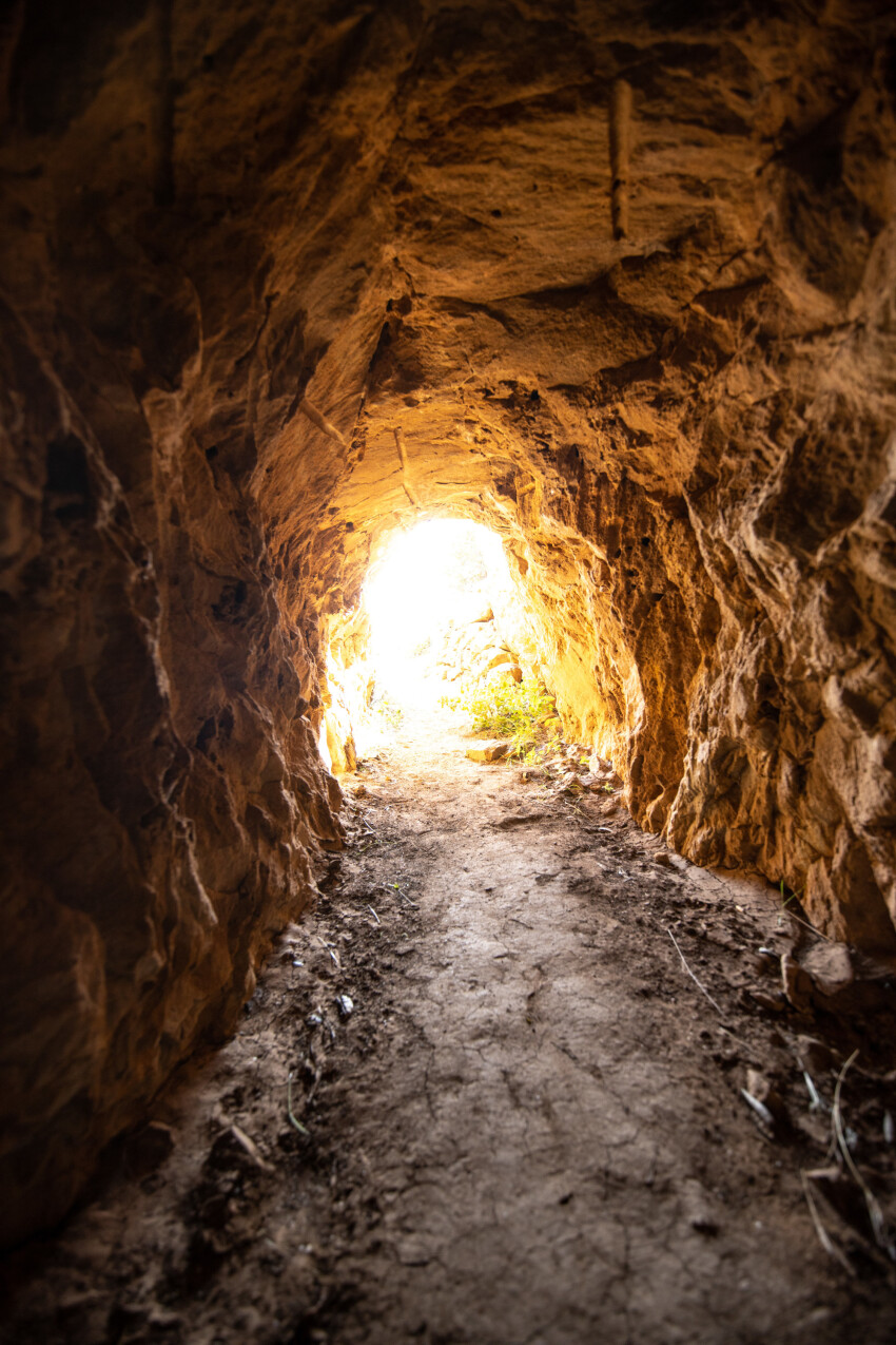 Cave with light at the end of the tunnel