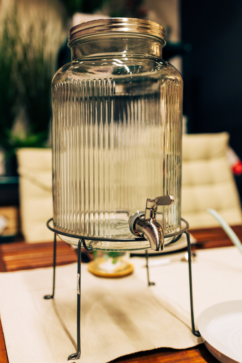 Juice dispenser on a set table