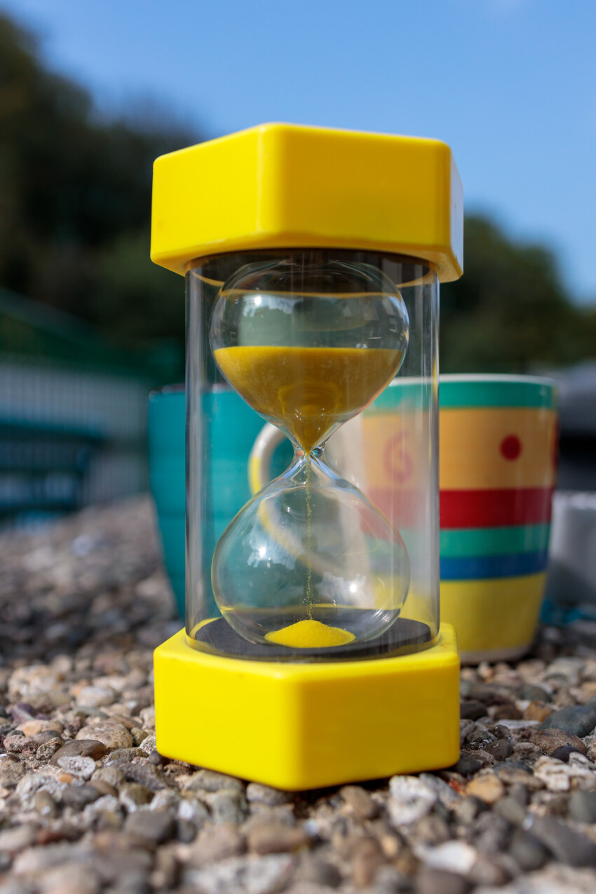 hourglass timepiece consisting of two glass bulbs