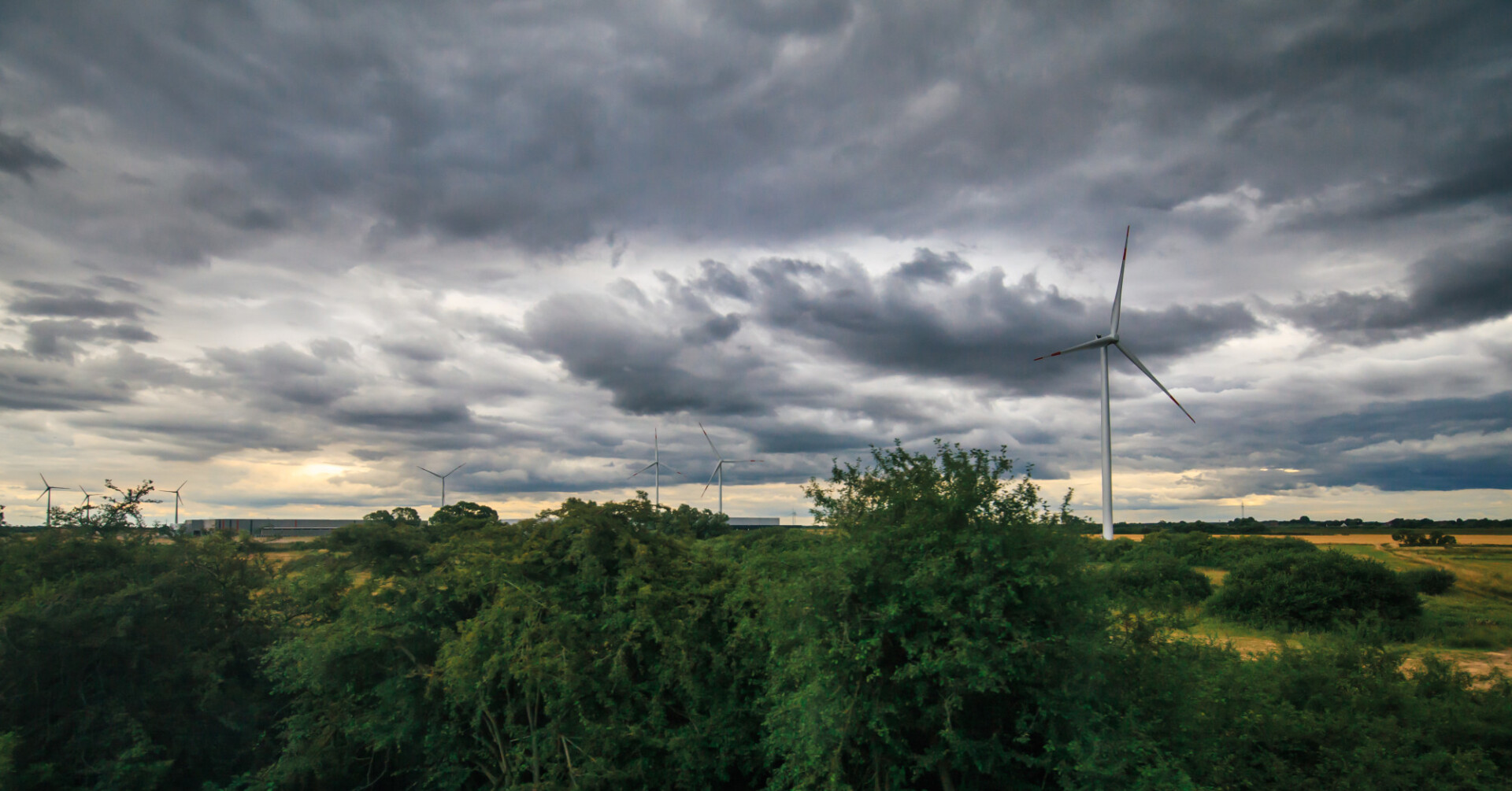 Wind farm dark storm clouds