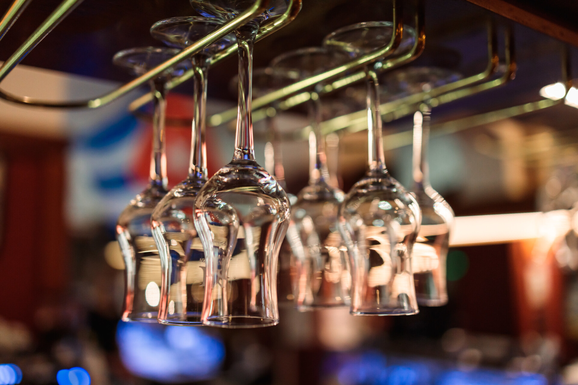 Glasses hanging in a bar